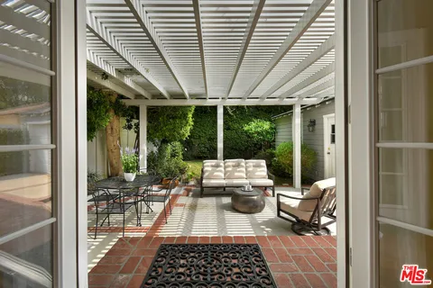 a backyard of a house with lots of green space