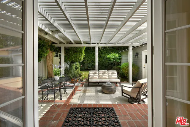 a backyard of a house with lots of green space