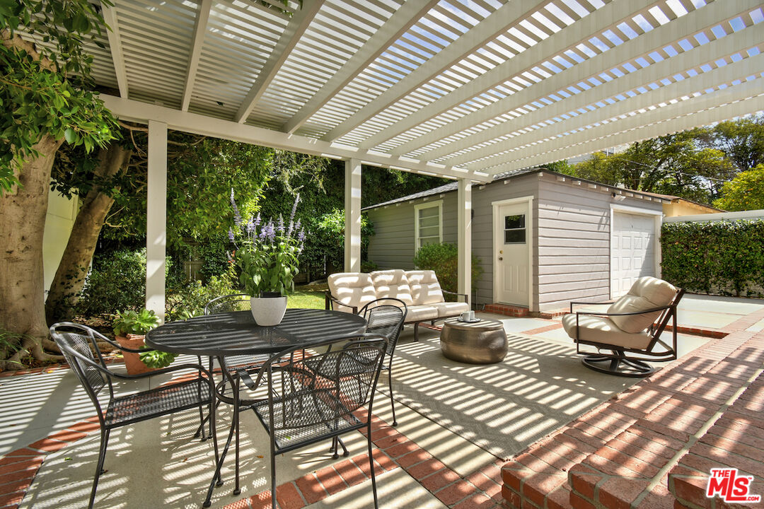 4226 Greenbush Avenue Sherman Oaks, CA 91423 - Photo 52 of 69 a outdoor living space with furniture and garden view
