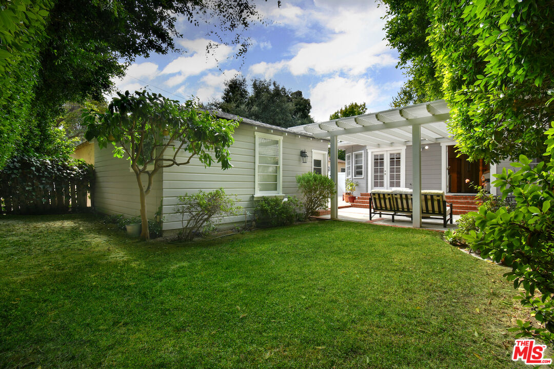 4226 Greenbush Avenue Sherman Oaks, CA 91423 - Photo 56 of 69 a view of a house with backyard and garden
