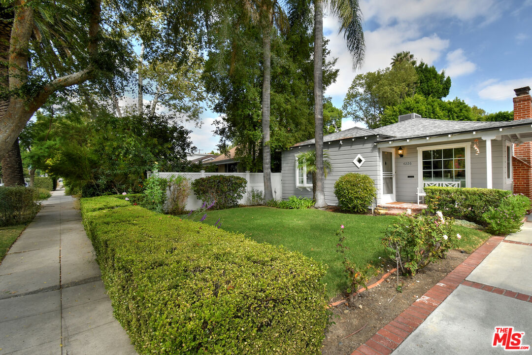 4226 Greenbush Avenue Sherman Oaks, CA 91423 - Photo 6 of 69 a view of a house with backyard and garden