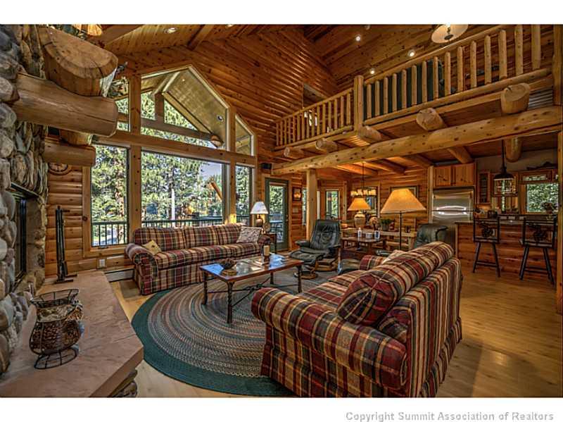 311 Red Hawk Circle Silverthorne, CO 80498 - Photo 2 of 25 a view of a living room and chandelier