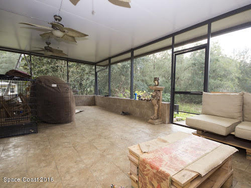 1210 Gopher Slough Road Mims, FL 32754 - Photo 23 of 32 Screened porch