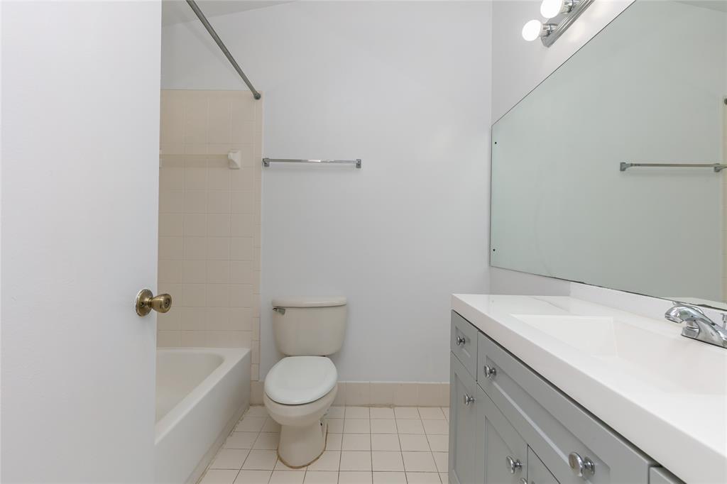 159 Hidden Ct Road, Unit I49 Hollywood, FL 33023 - Photo 12 of 21 a bathroom with a sink a toilet and shower