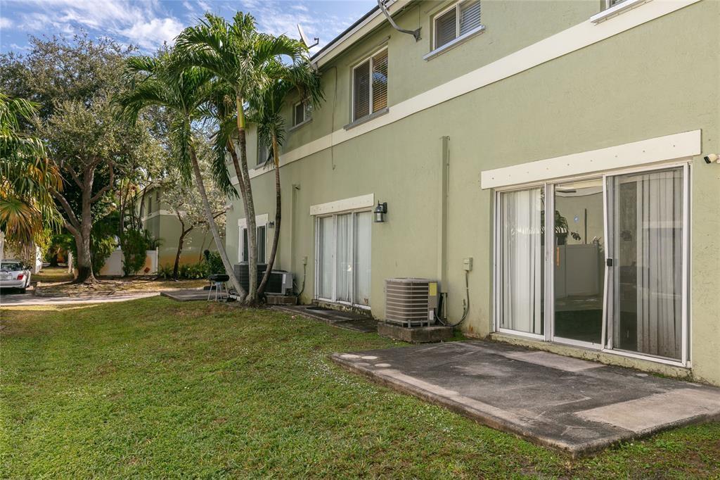159 Hidden Ct Road, Unit I49 Hollywood, FL 33023 - Photo 16 of 21 a view of a house with a yard