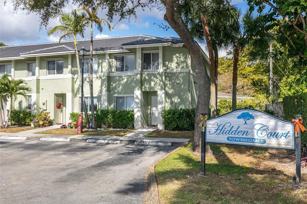 159 Hidden Ct Road, Unit I49 Hollywood, FL 33023 - Photo 17 of 21 a front view of a house with swimming pool