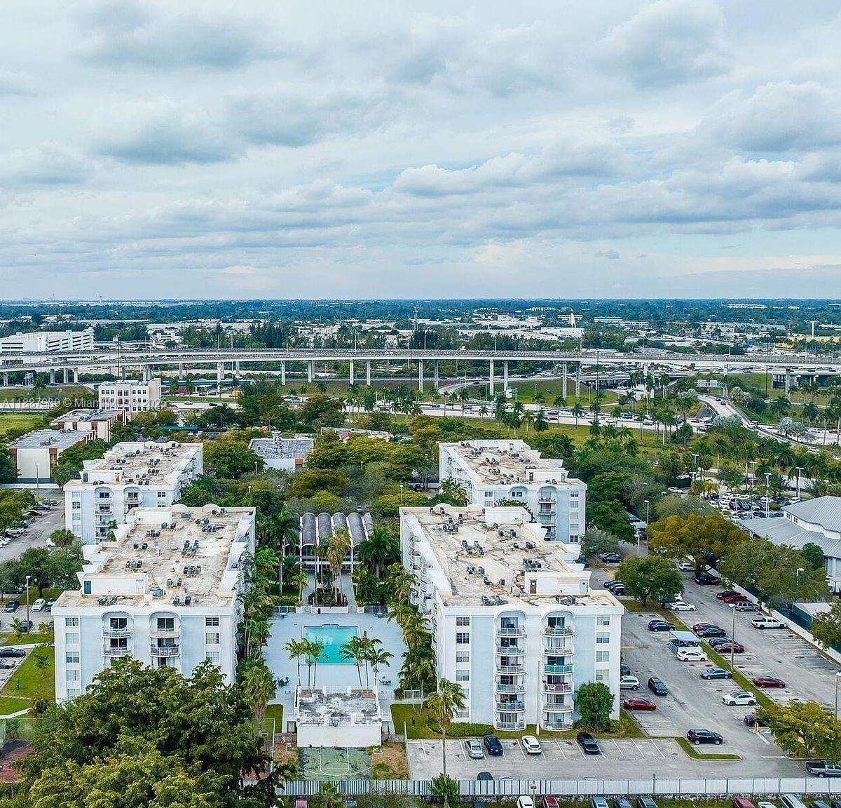 498 Northwest 165th Street, Unit D405 Miami, FL 33169 - Photo 12 of 12 a view of a city