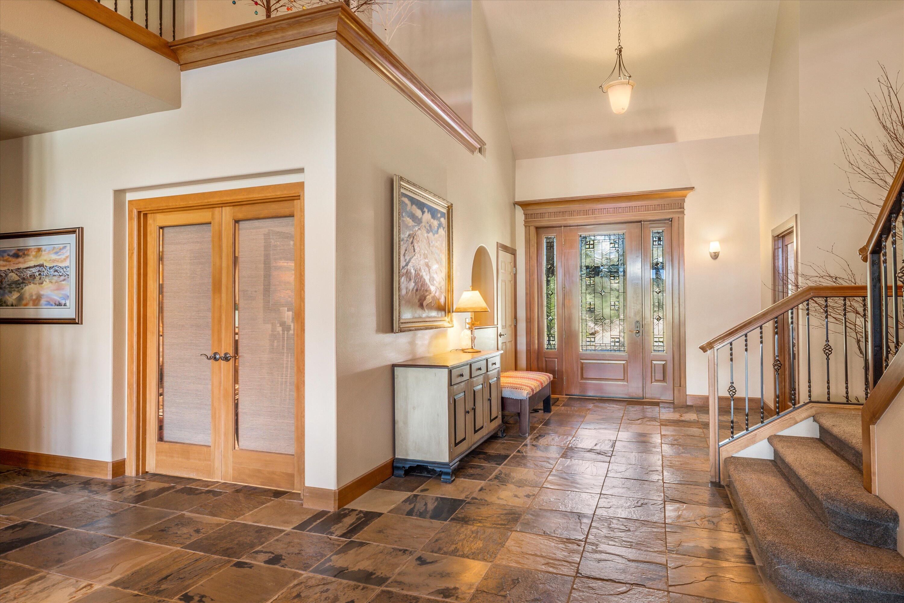 60540 Woodside Road Bend, OR 97702 - Photo 12 of 38 a view of a hallway with furniture and windows