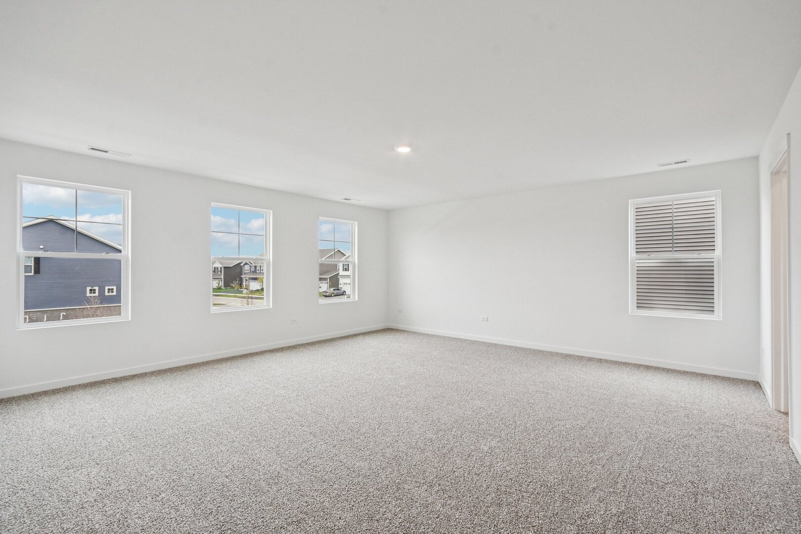 9967 Edgebrook Lane Huntley, IL 60142 - Photo 15 of 65 an empty room with windows