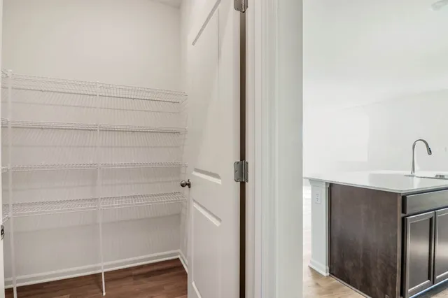 a view of a room with racks on the wall