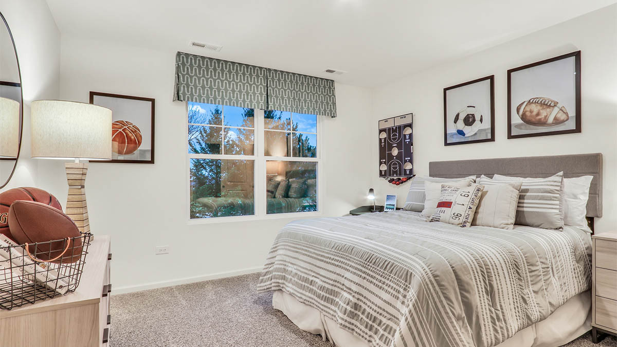 9967 Edgebrook Lane Huntley, IL 60142 - Photo 61 of 65 a bedroom with a bed and a window