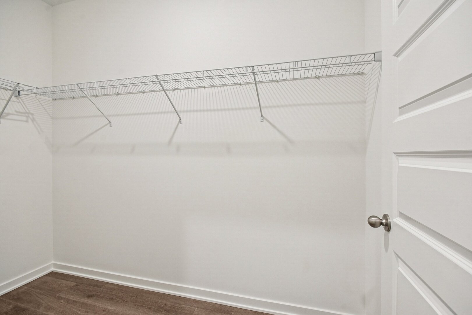 9967 Edgebrook Lane Huntley, IL 60142 - Photo 9 of 65 a view of a room with racks on the wall