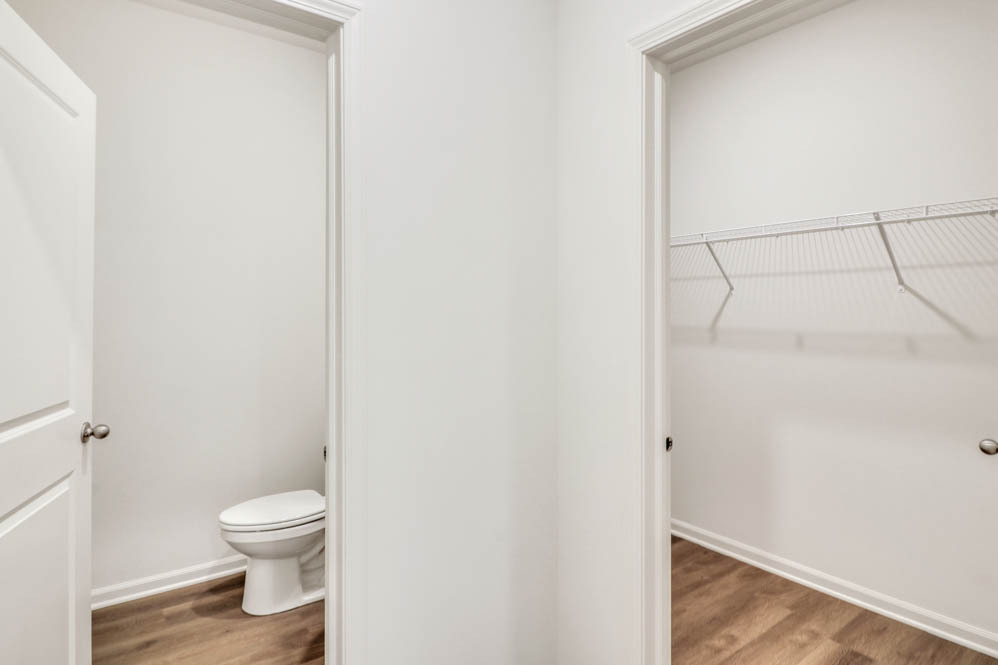 9967 Edgebrook Lane Huntley, IL 60142 - Photo 10 of 65 a white toilet sitting next to a shower