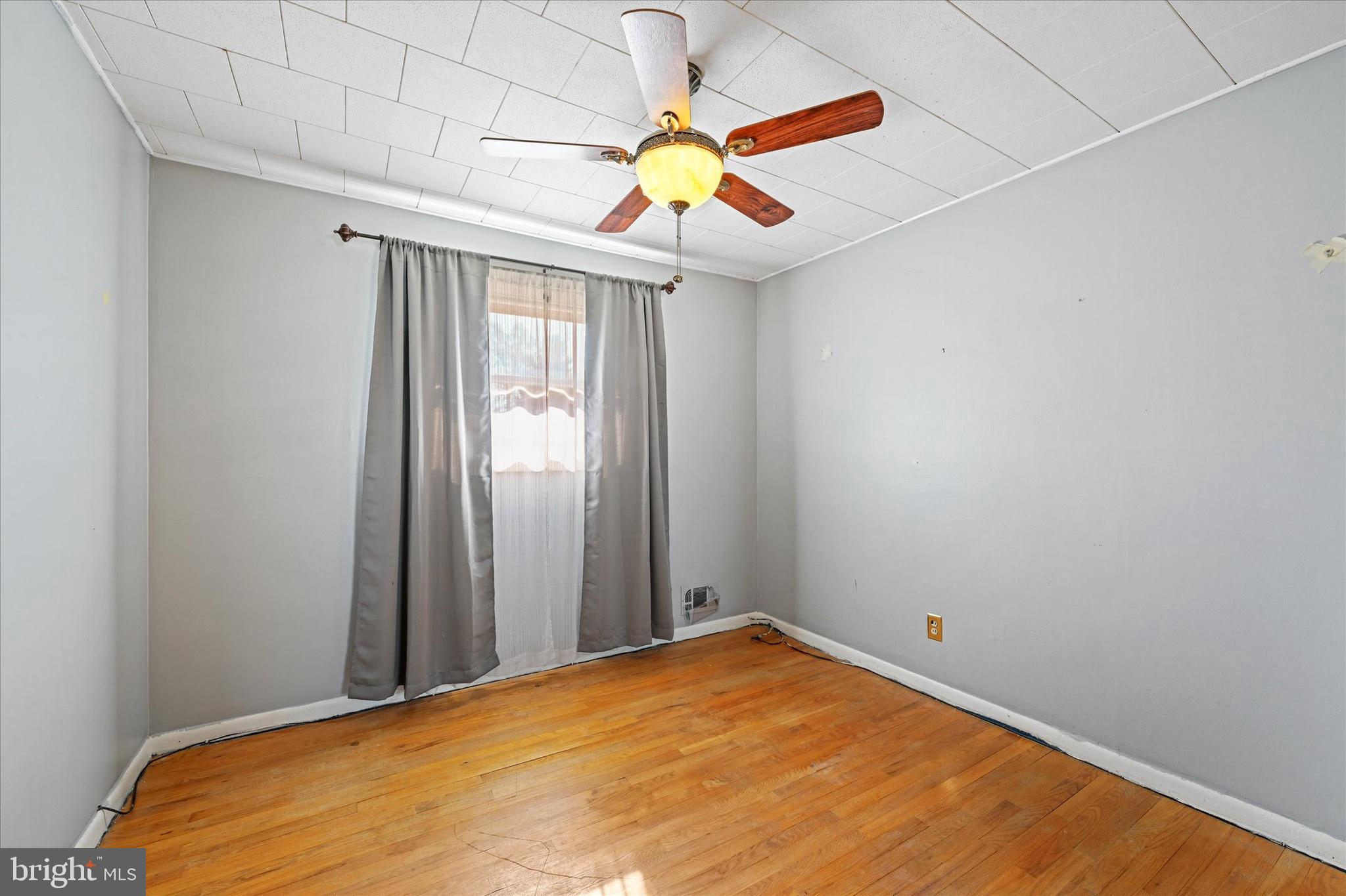 3714 Parkfield Road Windsor Mill, MD 21244 - Photo 14 of 28 a view of a room with a ceiling fan and window