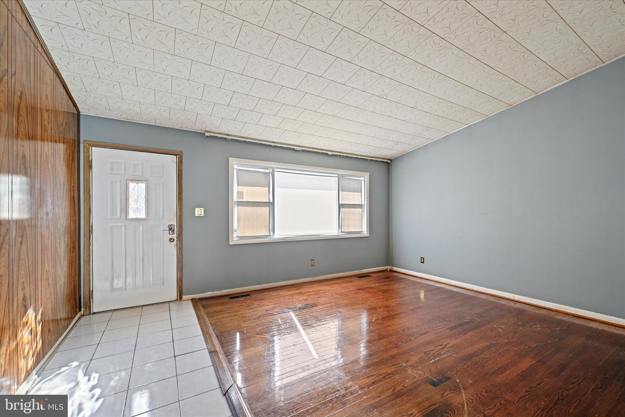 3714 Parkfield Road Windsor Mill, MD 21244 - Photo 3 of 28 a view of empty room with wooden floor and fan