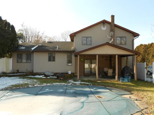 3920 Country Club Road Easton, PA 18045 - Photo 21 of 25 Back view of house and inground pool