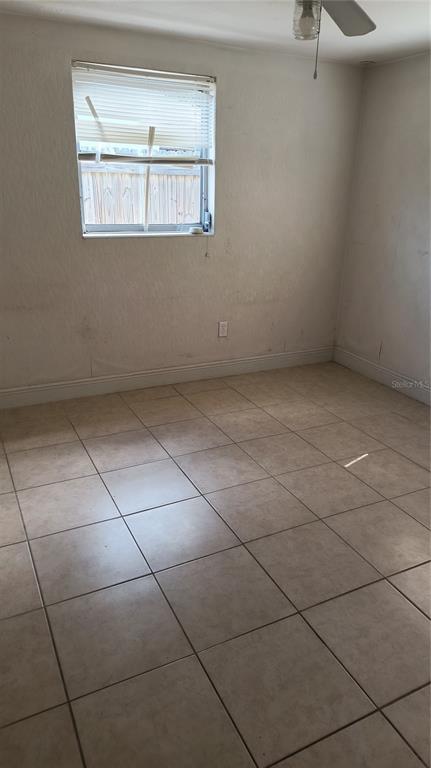 3910 Darlington Road Holiday, FL 34691 - Photo 7 of 11 a view of an empty room with a window