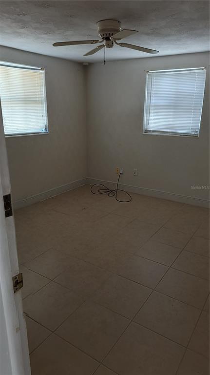 3910 Darlington Road Holiday, FL 34691 - Photo 10 of 11 a bathroom with a window