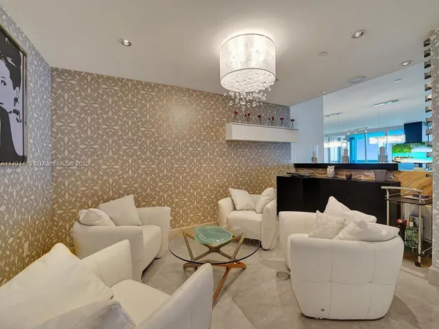a bathroom with a granite countertop bathtub shower and toilet