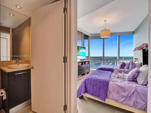 a view of a city with tall buildings