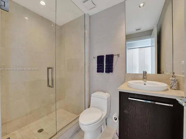 a view of a city with tall buildings