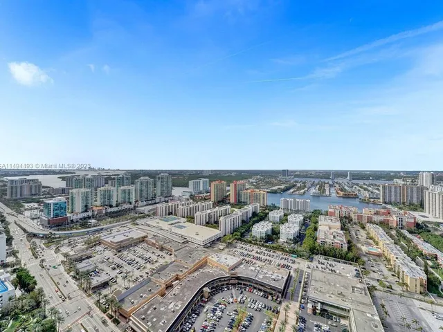 a view of city with tall buildings