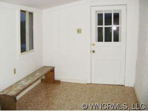 149 Howards Hollow Road Canton, NC 28716 - Photo 7 of 12 a view of an empty room