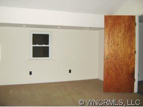 149 Howards Hollow Road Canton, NC 28716 - Photo 8 of 12 a view of an empty room