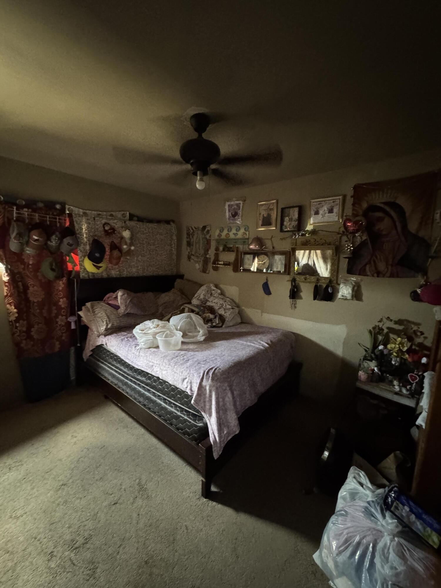 704 North Floral Street Visalia, CA 93291 - Photo 38 of 51 a bed sitting in a room next to a window