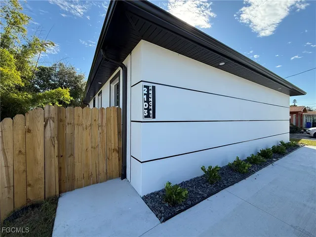 a backyard of a house with seating space