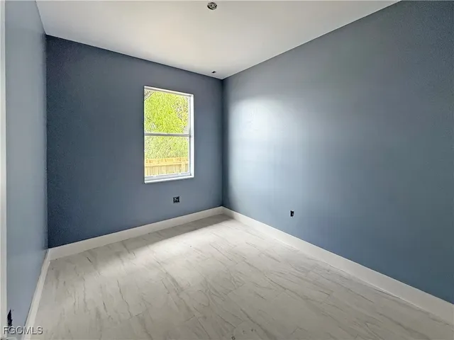 a view of an empty room with window