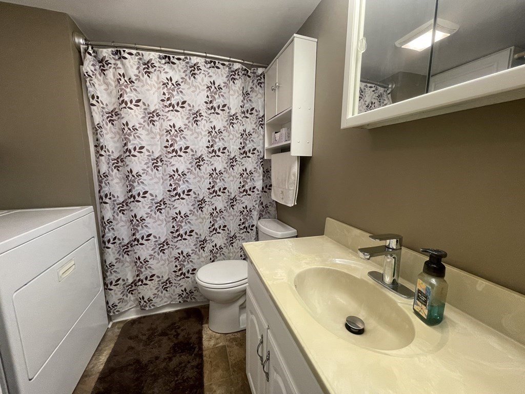 4 Oakhurst Road Ayer, MA 01432 - Photo 12 of 13 a bathroom with a sink and a toilet