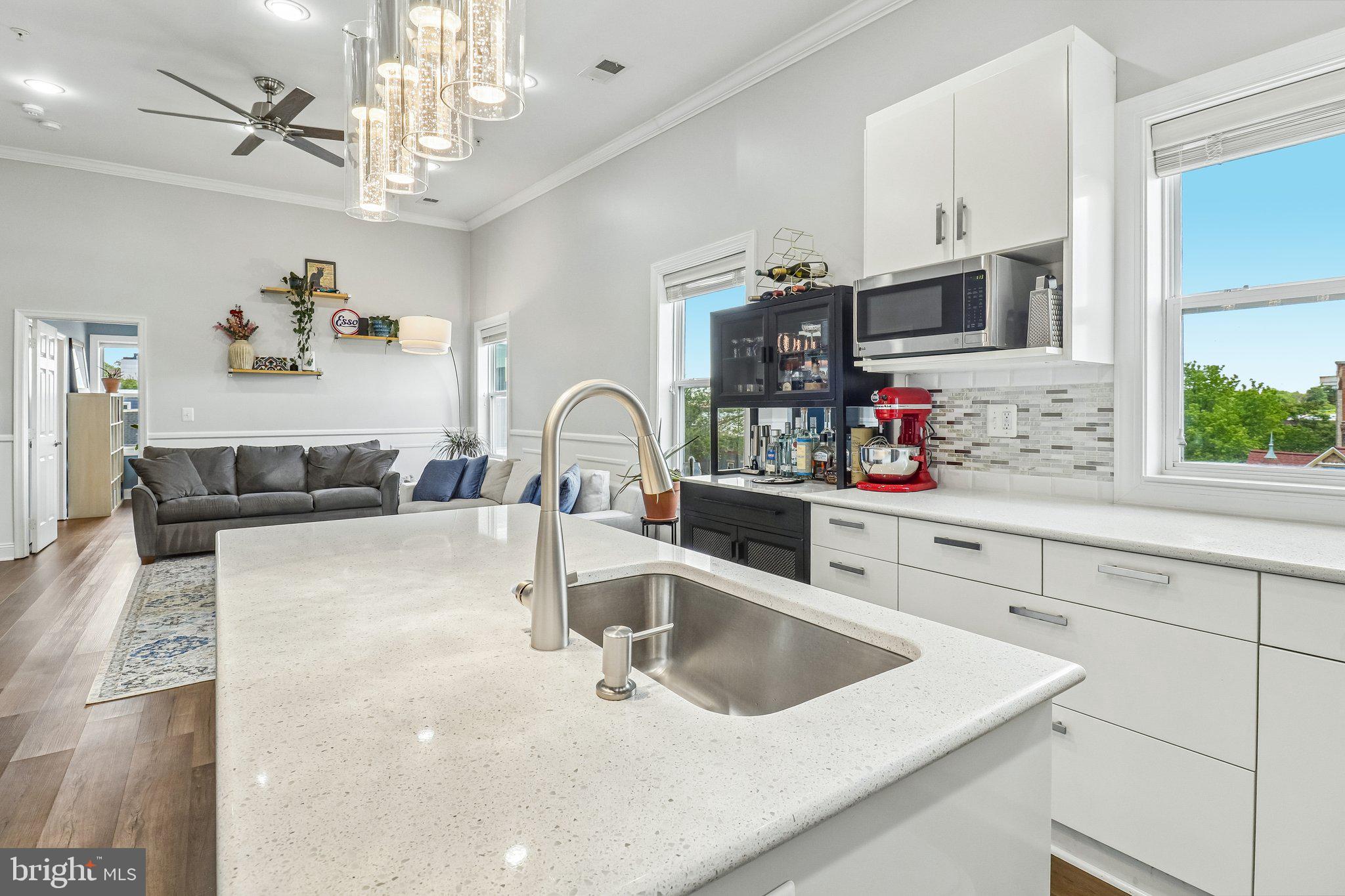 233 S Street Northeast, Unit 5 Washington, DC 20002 - Photo 15 of 41 Modern kitchen with bright ambiance.