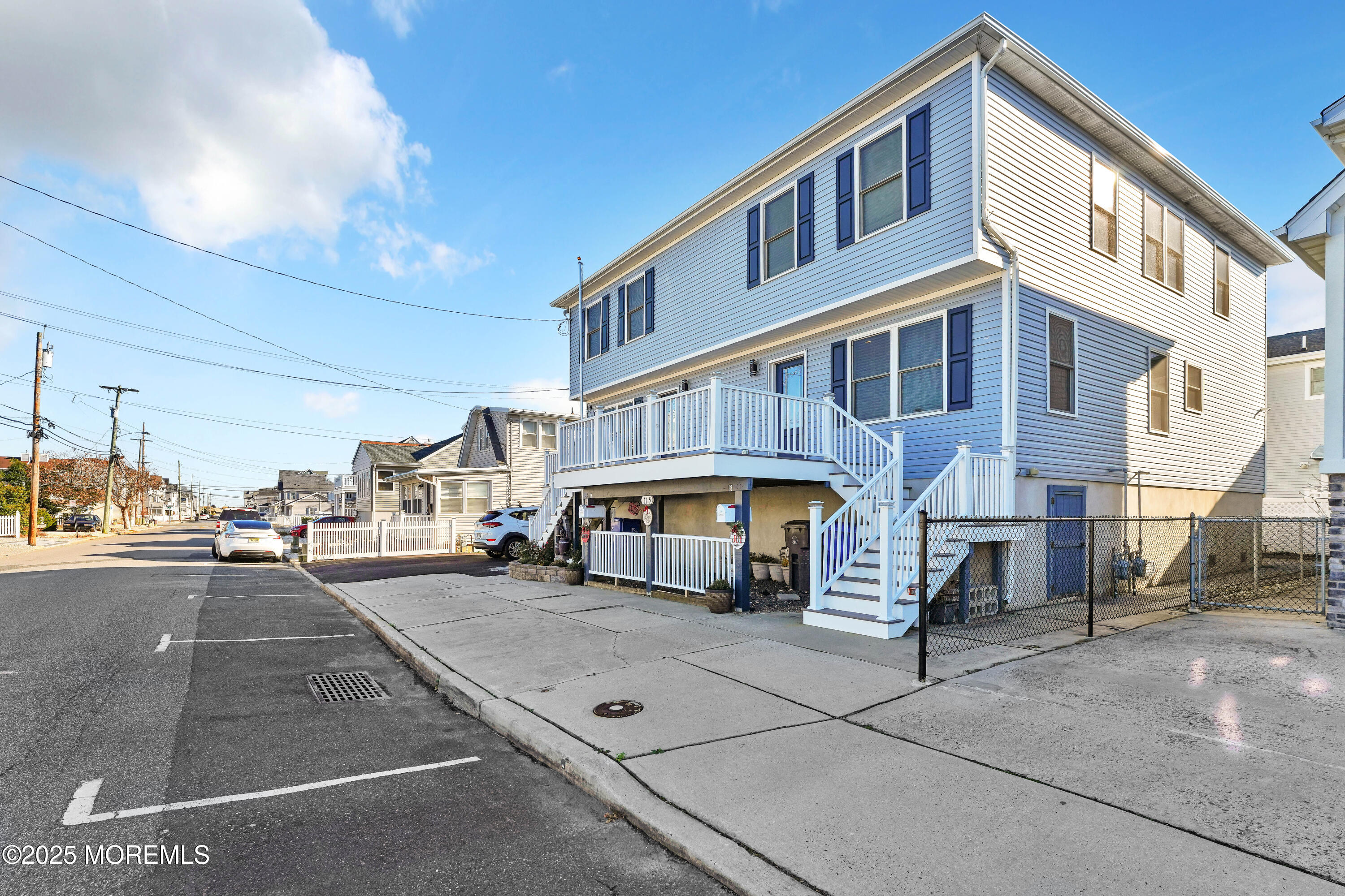 115 Harding Avenue, Unit B Seaside Heights, NJ 08751 - Photo 2 of 16 a front view of a building with street