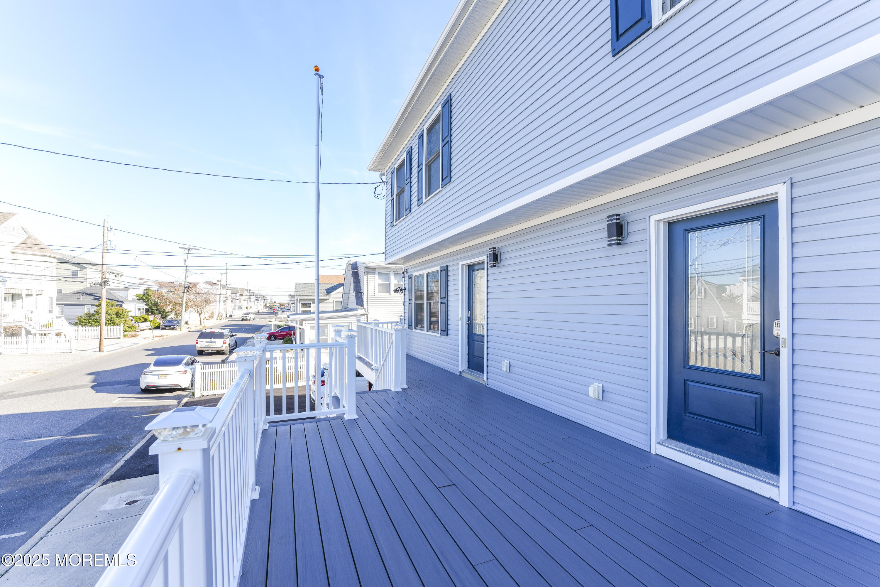 115 Harding Avenue, Unit B Seaside Heights, NJ 08751 - Photo 3 of 16 a view of a patio with table and chairs