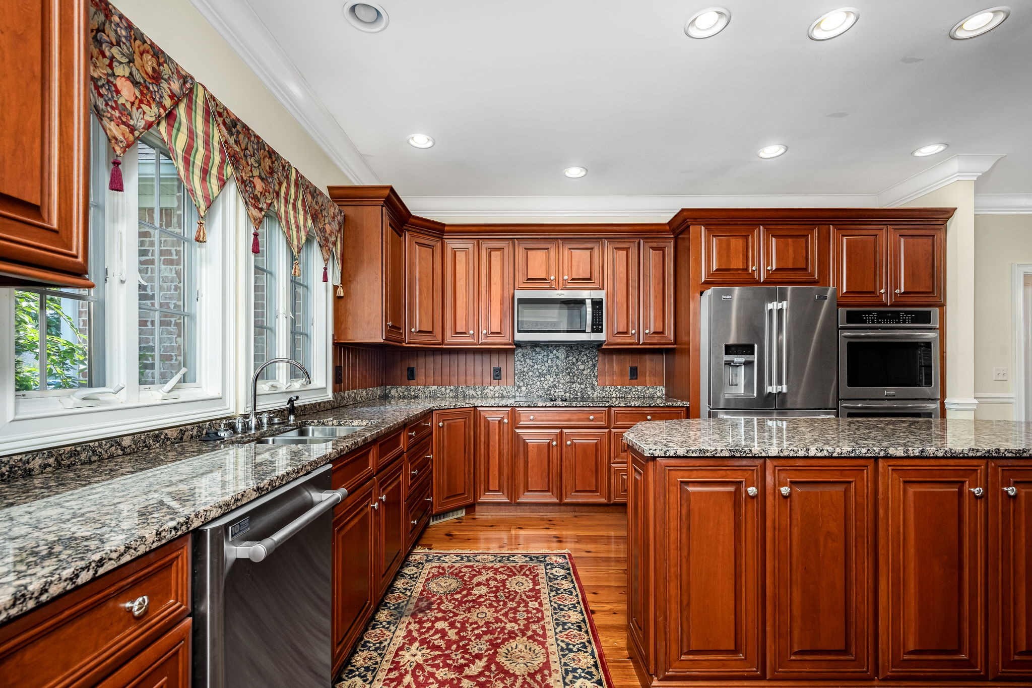255 Parks Drive Normandy, TN 37360 - Photo 11 of 82 a kitchen with stainless steel appliances granite countertop a sink and a stove