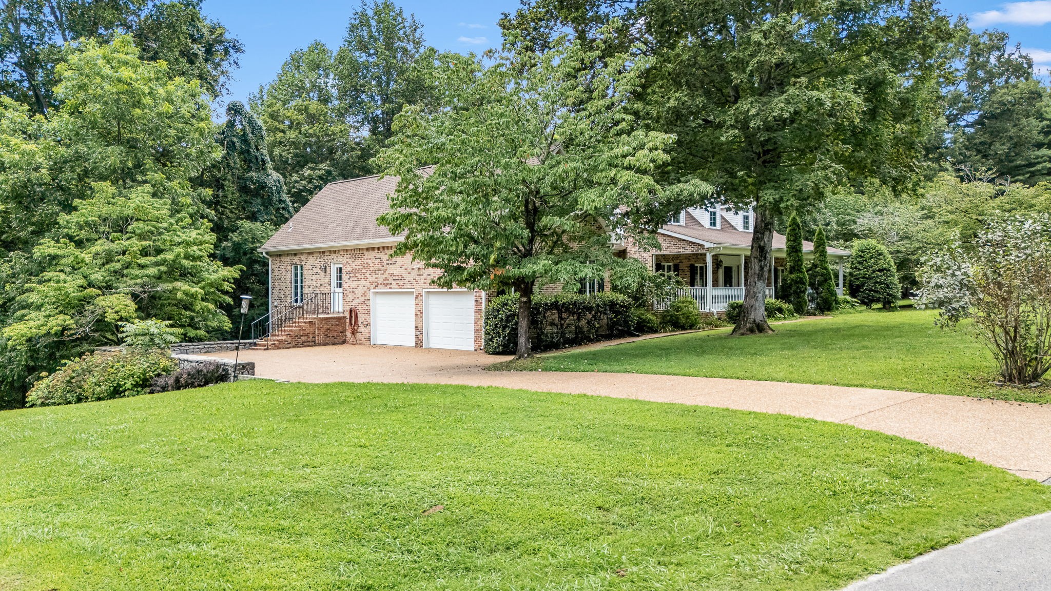 255 Parks Drive Normandy, TN 37360 - Photo 58 of 82 a front view of a house with a yard and trees