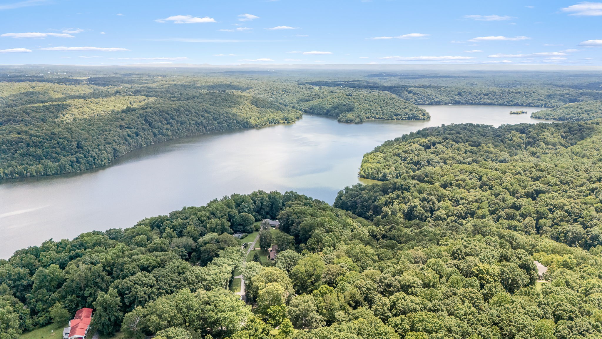 255 Parks Drive Normandy, TN 37360 - Photo 79 of 82 a view of a lake with a mountain in the background