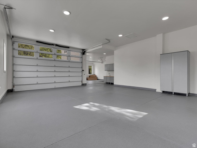 13216 Telemark Lane Draper, UT 84020 - Photo 36 of 41 Garage featuring recessed lighting and baseboards