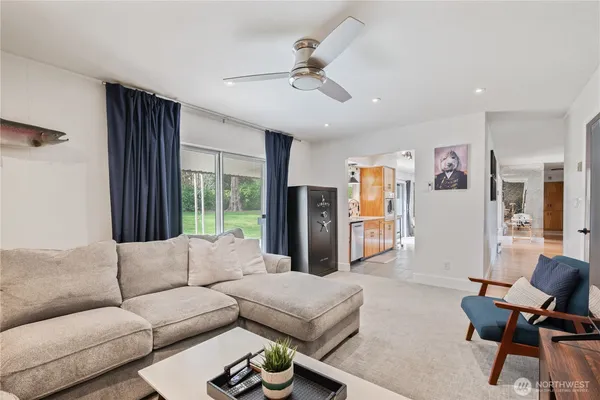 a living room with furniture and a window