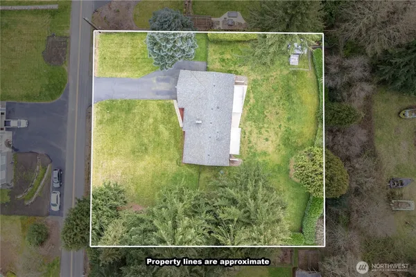 a view of a swimming pool with a yard