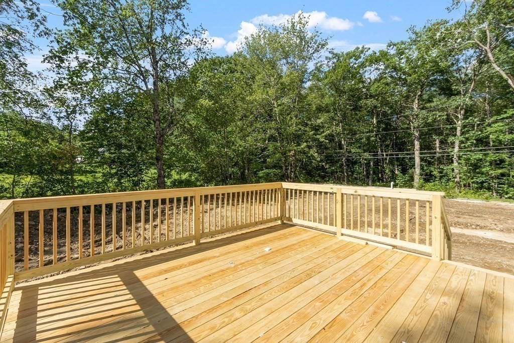 21 Paddock Road Rutland, MA 01543 - Photo 5 of 18 a view of balcony with wooden floor