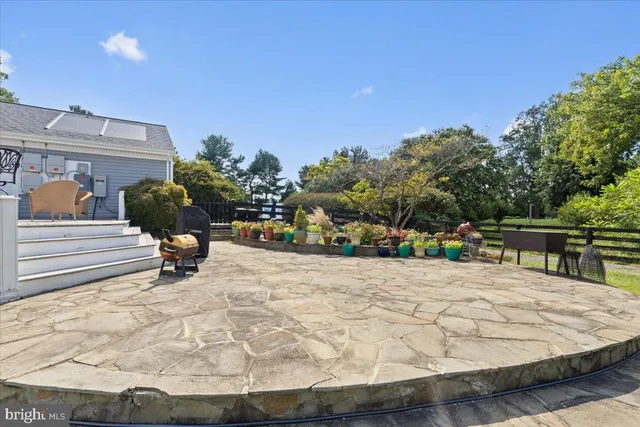 a view of a terrace with sitting area