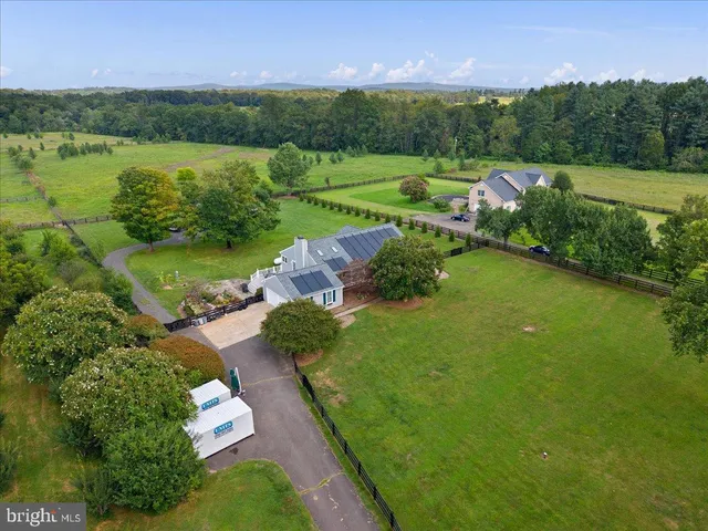 a view of a lake with a yard