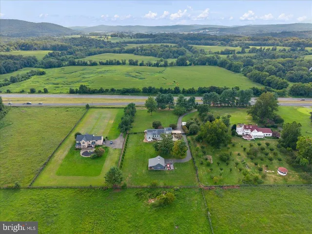 a view of a lake with a yard