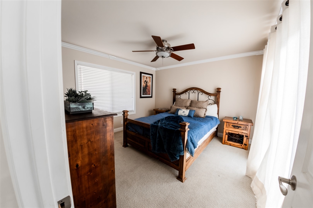 16716 Valle Verde Road Poway, CA 92064 - Photo 19 of 25 Guest bedroom with individual bathroom and door leading to courtyard
