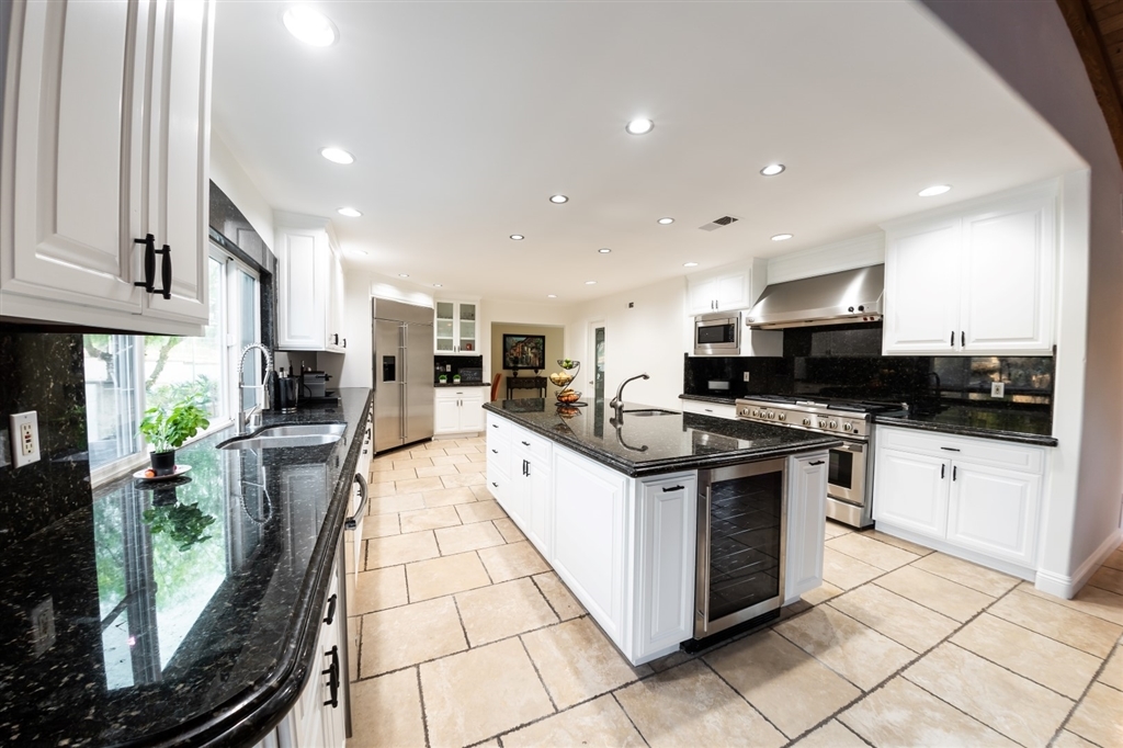 16716 Valle Verde Road Poway, CA 92064 - Photo 6 of 25 Open gourmet remodeled kitchen