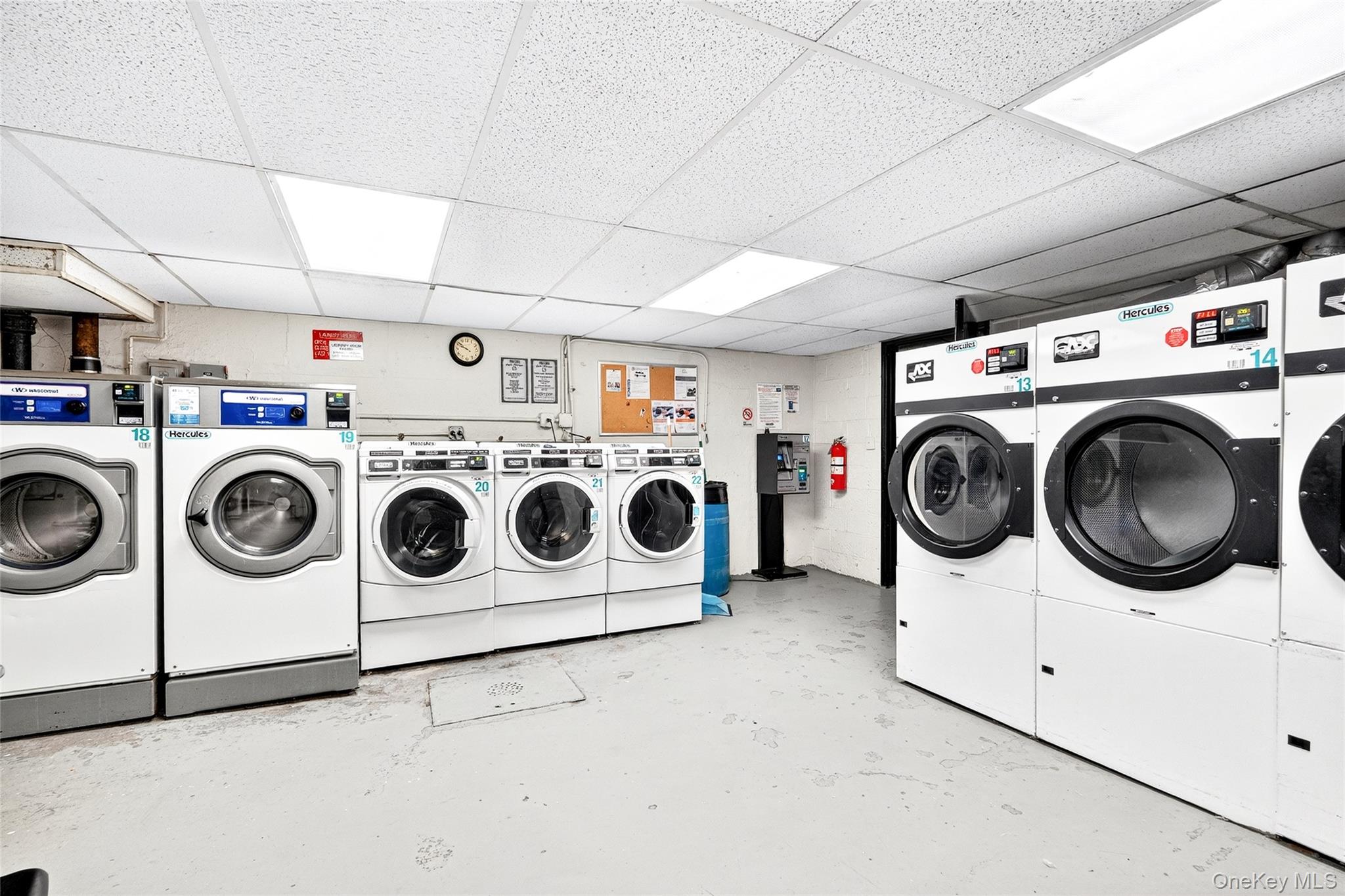 770 Bronx River Road, Unit A36 Bronxville, NY 10708 - Photo 16 of 22 a utility room with dryer washer and dryer