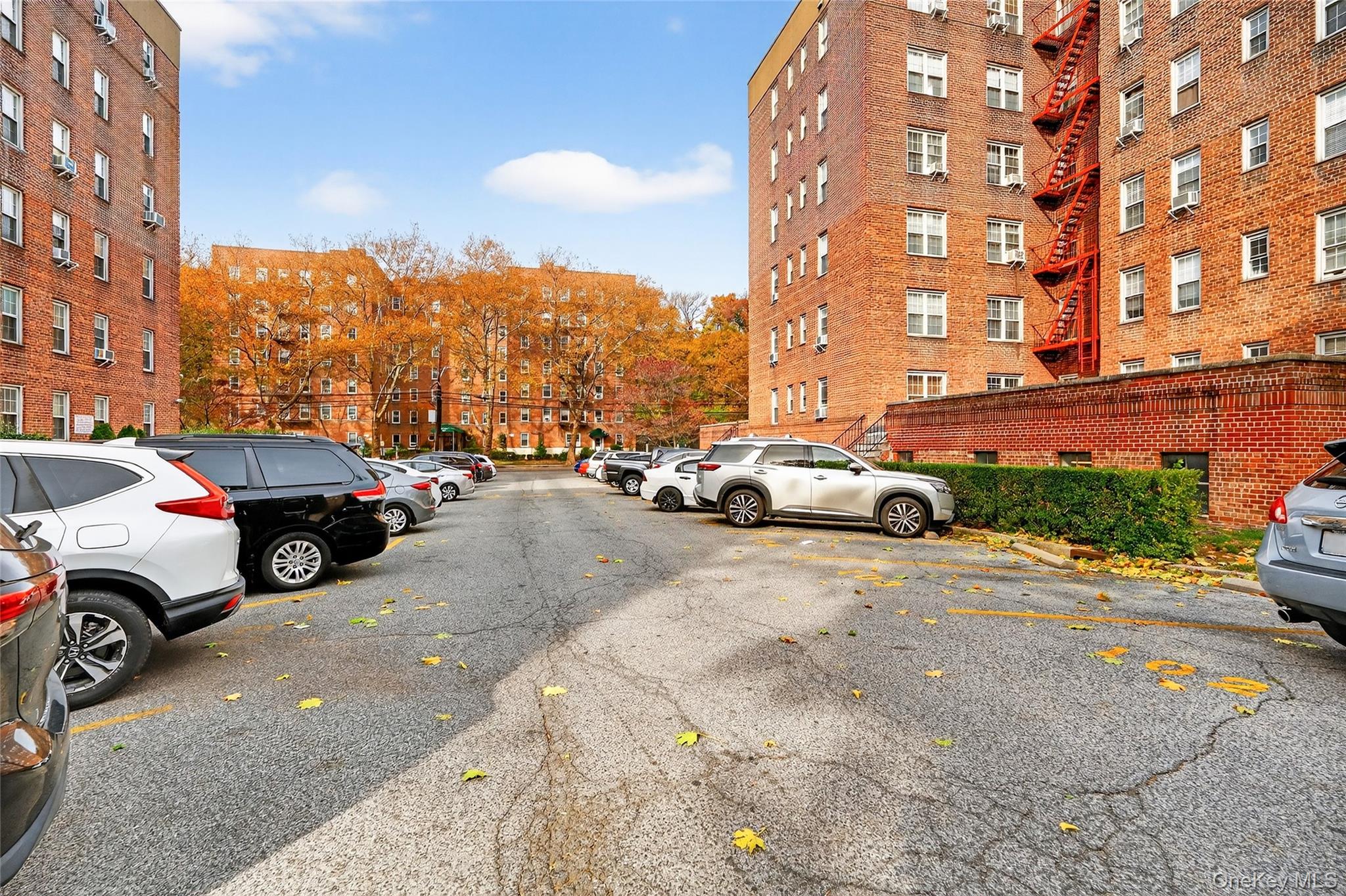770 Bronx River Road, Unit A36 Bronxville, NY 10708 - Photo 21 of 22 a view of a cars parked on the side of a street