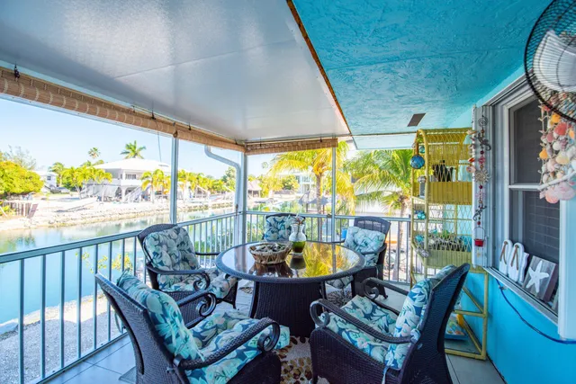 a living room with large windows